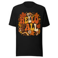 Schriftzug "HELLO FALL" in großen, bunten Buchstaben umgeben von orangefarbenen Ahornblättern, roten Fliegenpilzen mit weißen Punkten, gelben und weißen Blumen sowie dekorativen Sternen und Blättern. – Unisex Staple T-Shirt | Bella + Canvas 3001