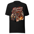 Illustration eines Hot Rods mit Flammen und Rauch, gefahren von einem Skelett in Lederjacke und Cap, mit dem Schriftzug "Garage Legends" im Hintergrund. – Unisex Staple T-Shirt | Bella + Canvas 3001